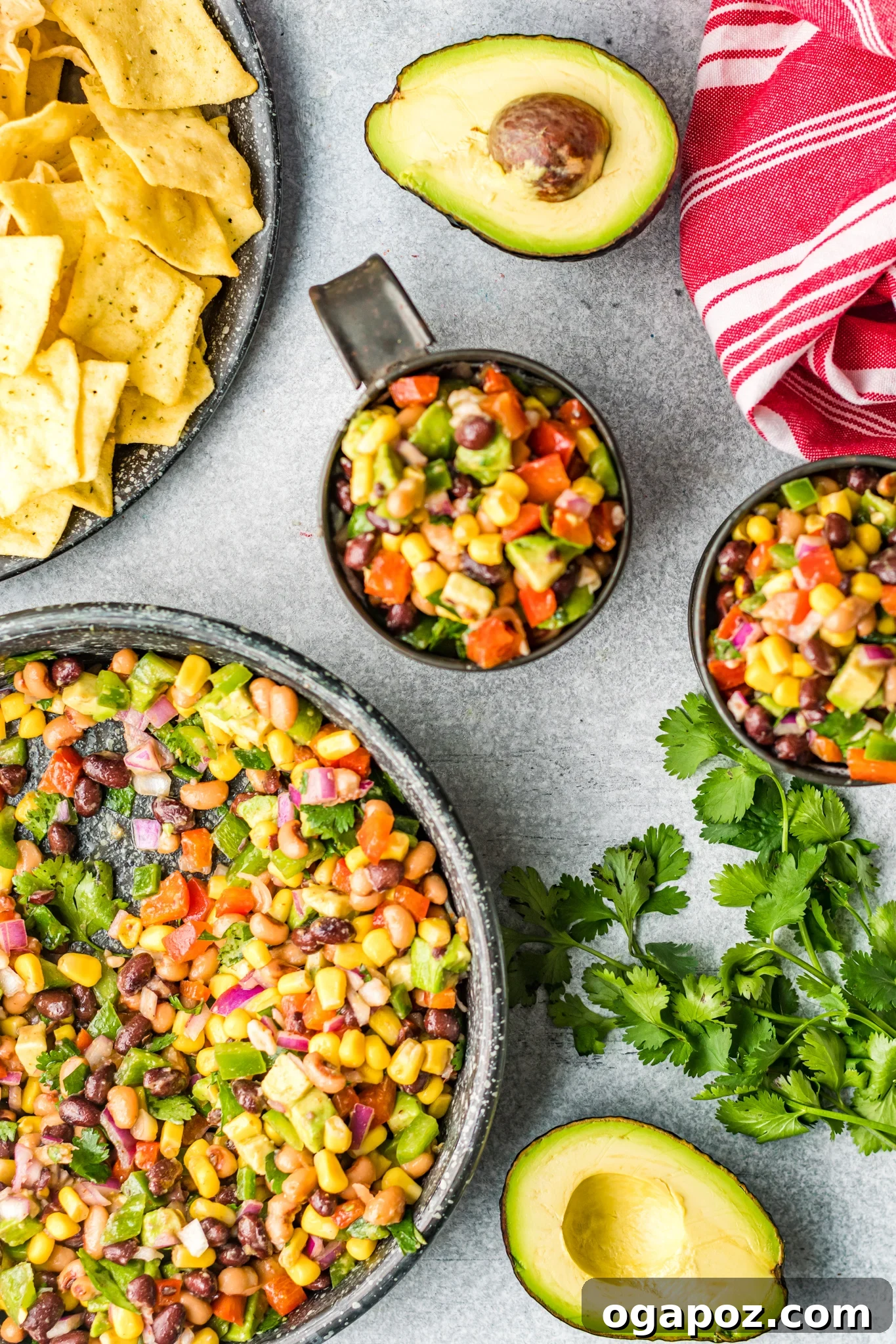 Southwestern Fiesta Dip 2 A vibrant bowl of Cowboy Caviar Recipe, showcasing black-eyed peas, black beans, corn, and colorful peppers.