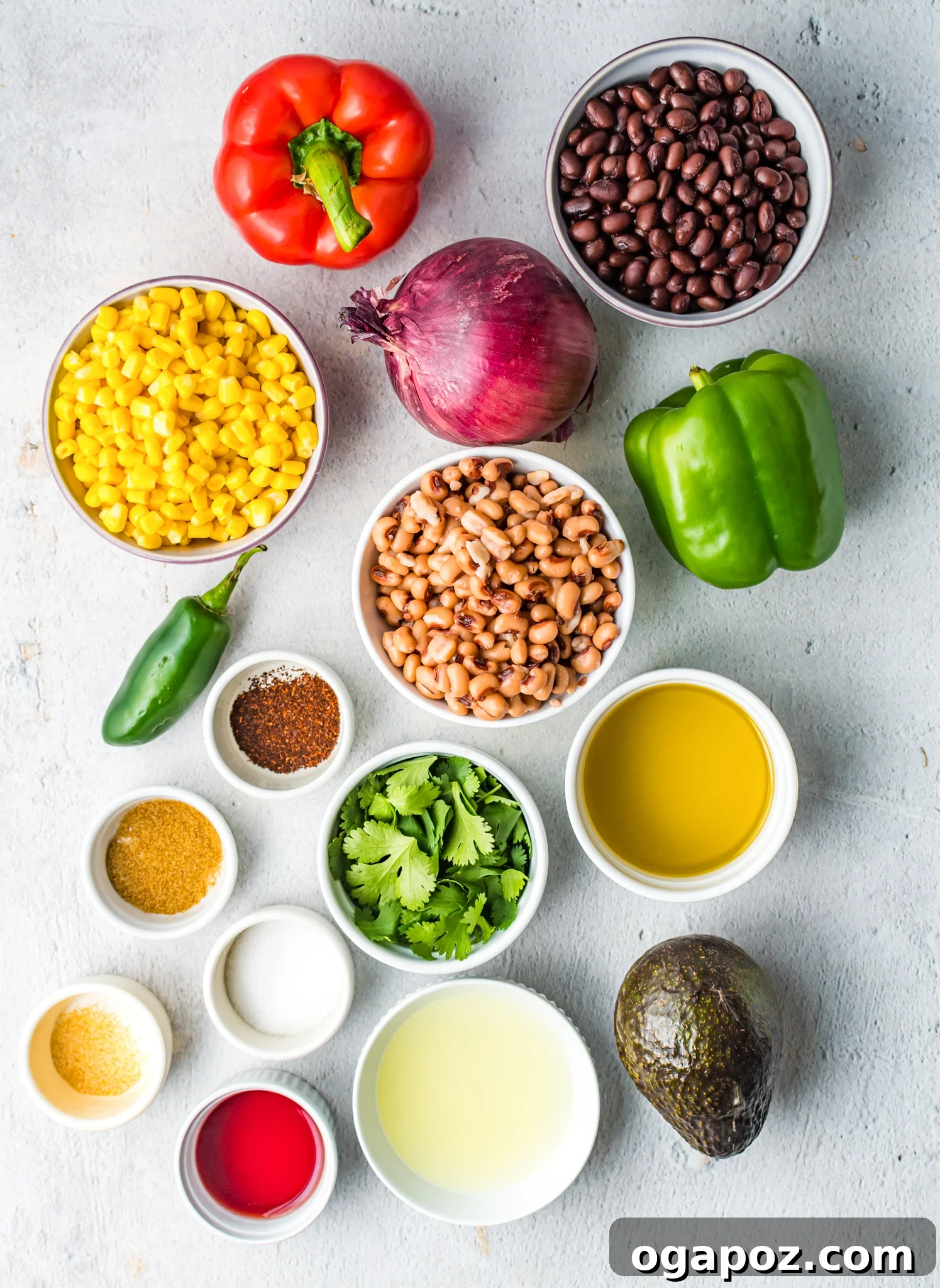 Southwestern Fiesta Dip 3 All the fresh ingredients laid out for making Cowboy Caviar, including black-eyed peas, corn, peppers, and lime.