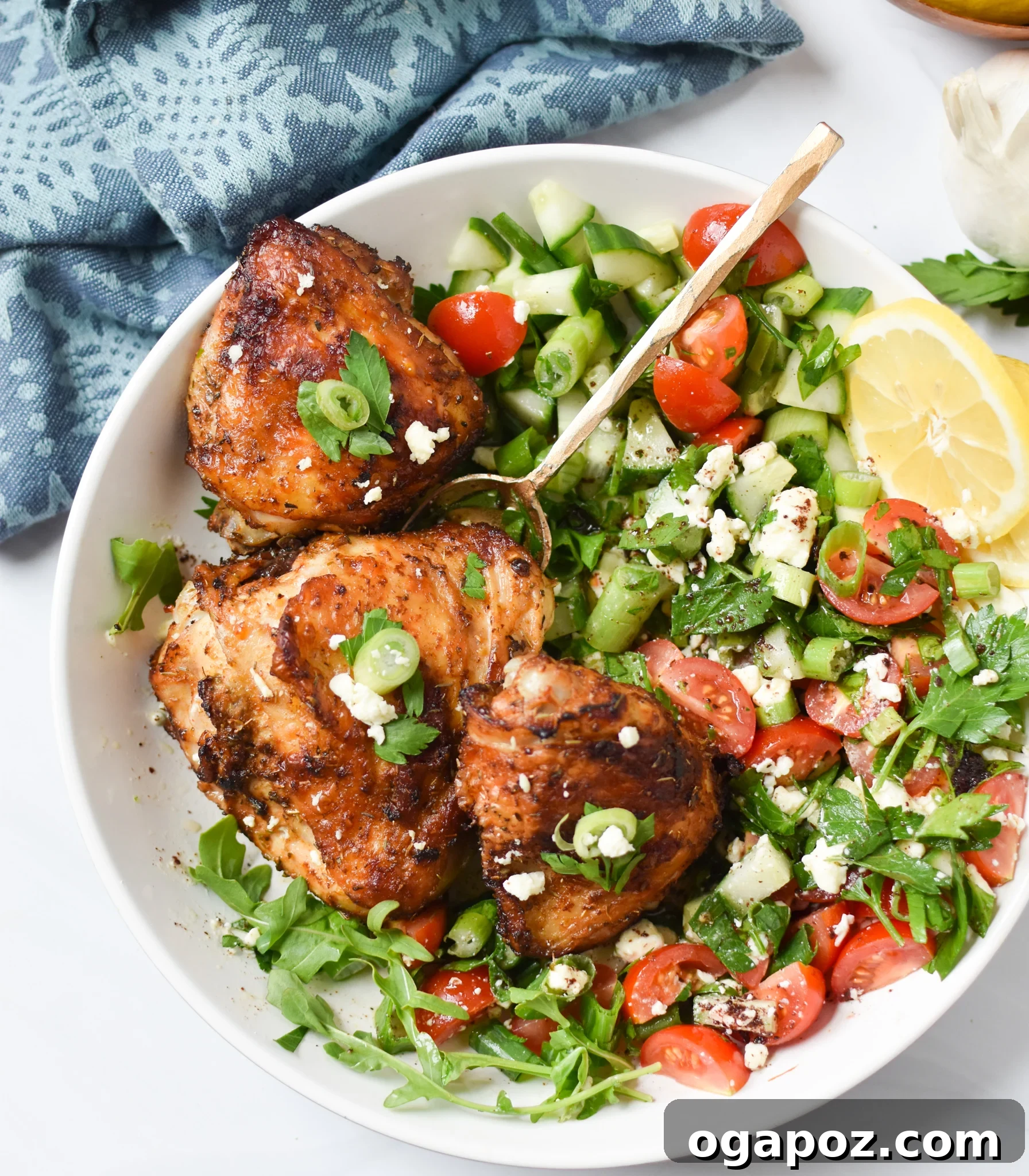 Zesty Mediterranean Air Fryer Chicken Thighs 8 Close-up of a single Air Fryer Mediterranean Chicken Thigh in a bowl, showcasing its golden-brown, crispy skin.