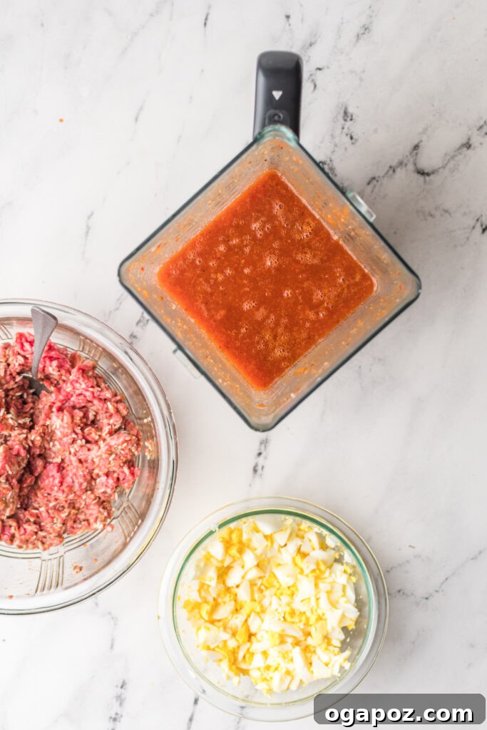 Smoky Chipotle Meatballs 7 Blended chipotle tomato sauce in a blender jar.