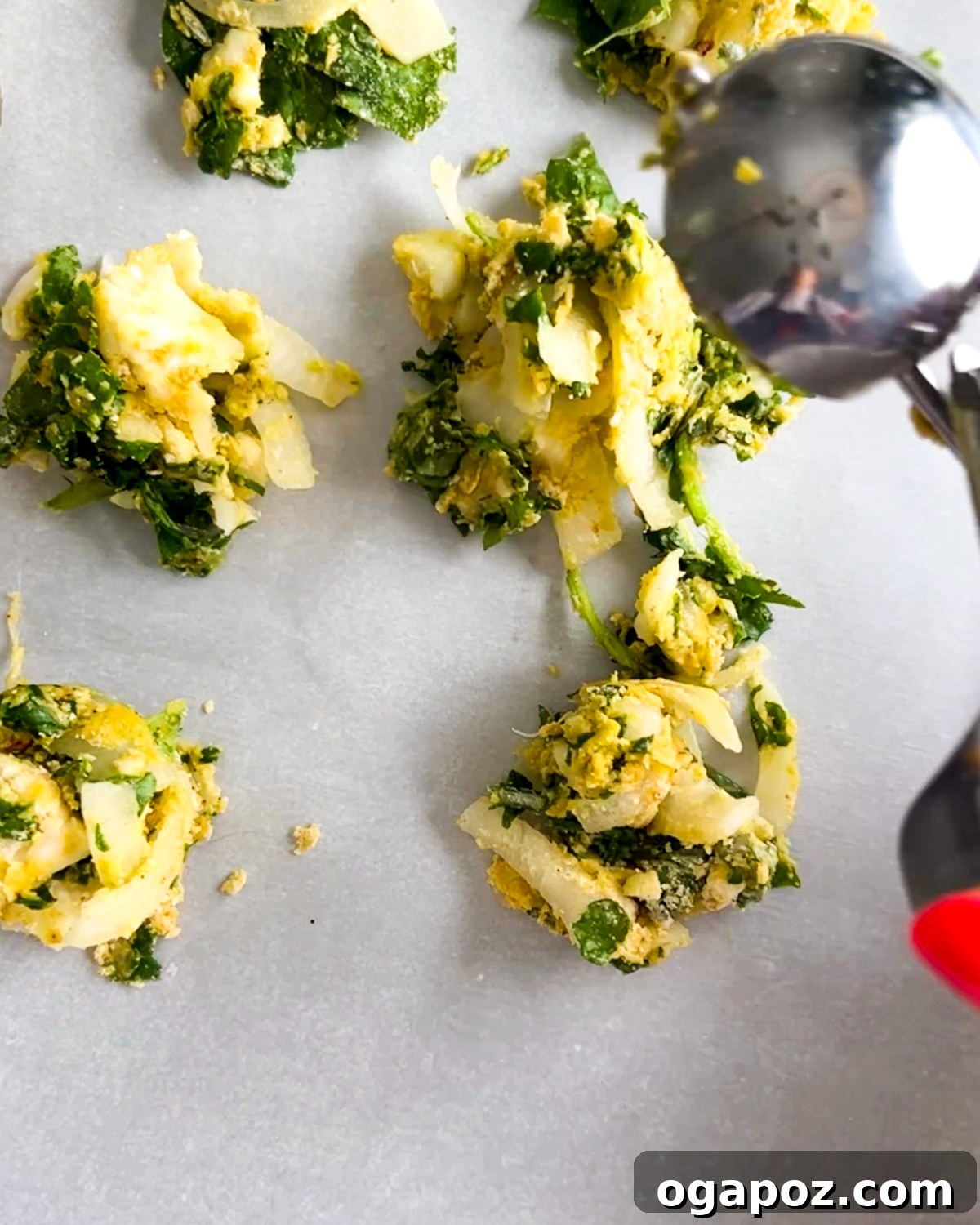 Indian Pakora Effortless Crispy Vegetable Fritters 5 Small, roughly shaped balls of pakora mixture, ready for frying.