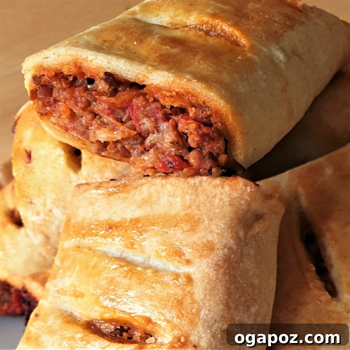 26+ Meat Sauce Masterpieces Delicious Dinners and Effortless Encore Meals 15 Flaky Bolognese Sausage Rolls served with sauce