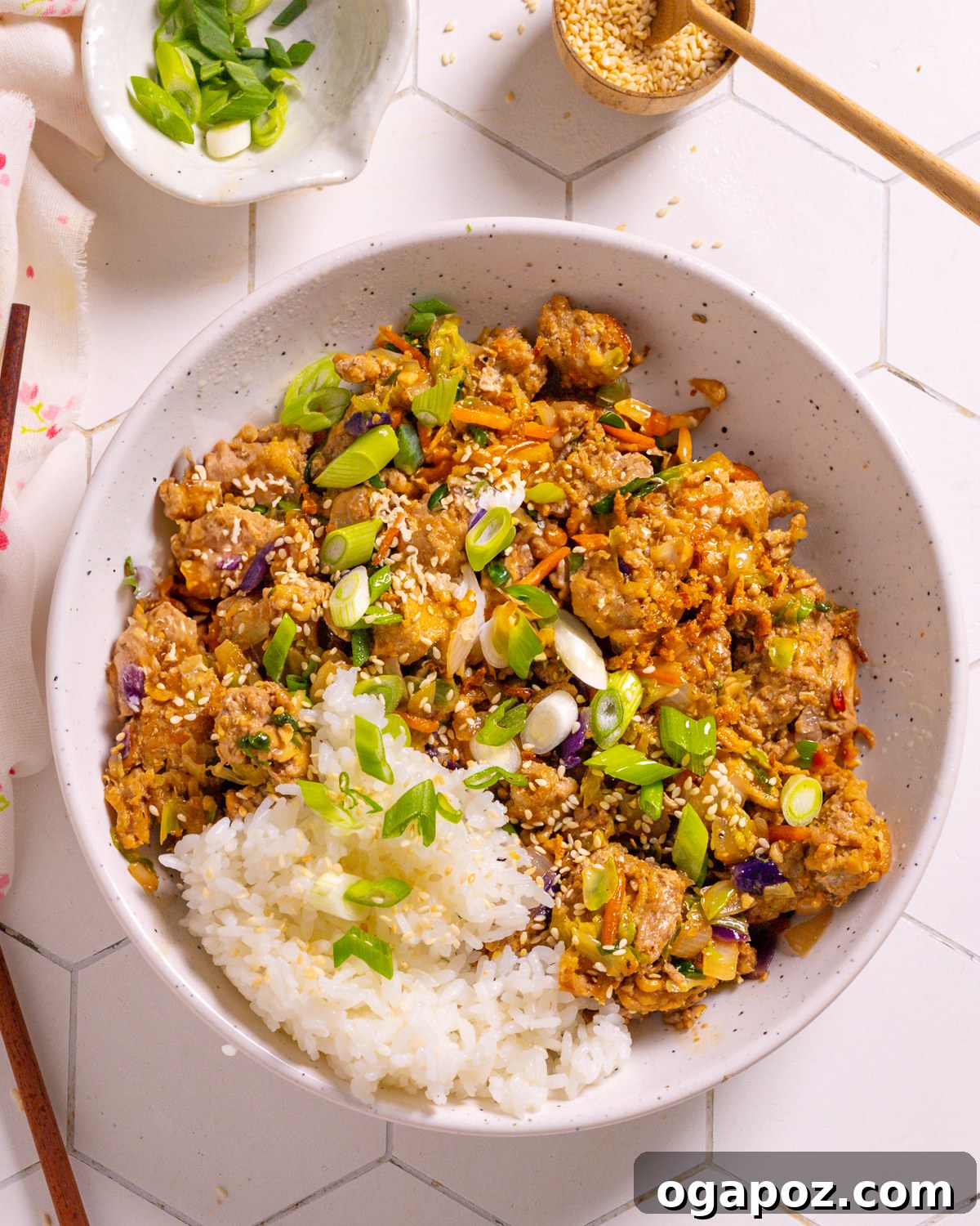 10 Flavorful Ground Beef and Cabbage Recipes 2 Egg Roll in a bowl with rice.