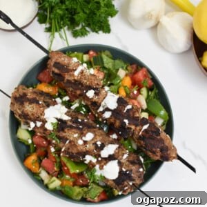 Turkey Kofta Kebab Recipe served on a fresh salad.