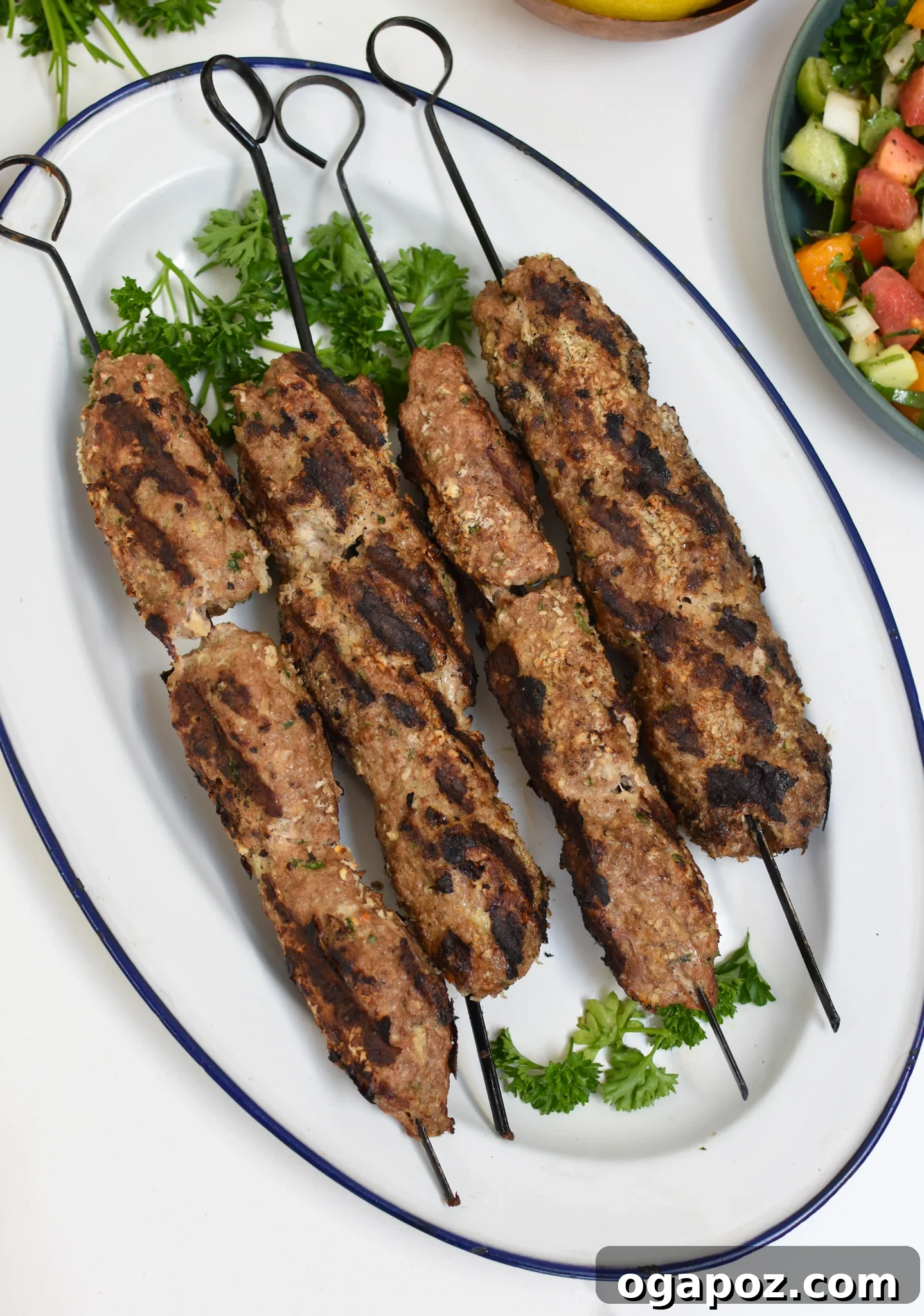 Spiced Turkey Kofta Skewers 4 Fresh parsley, a key ingredient, being finely chopped for the Turkey Kofta Kebab Recipe, highlighting the importance of fresh herbs in the dish.