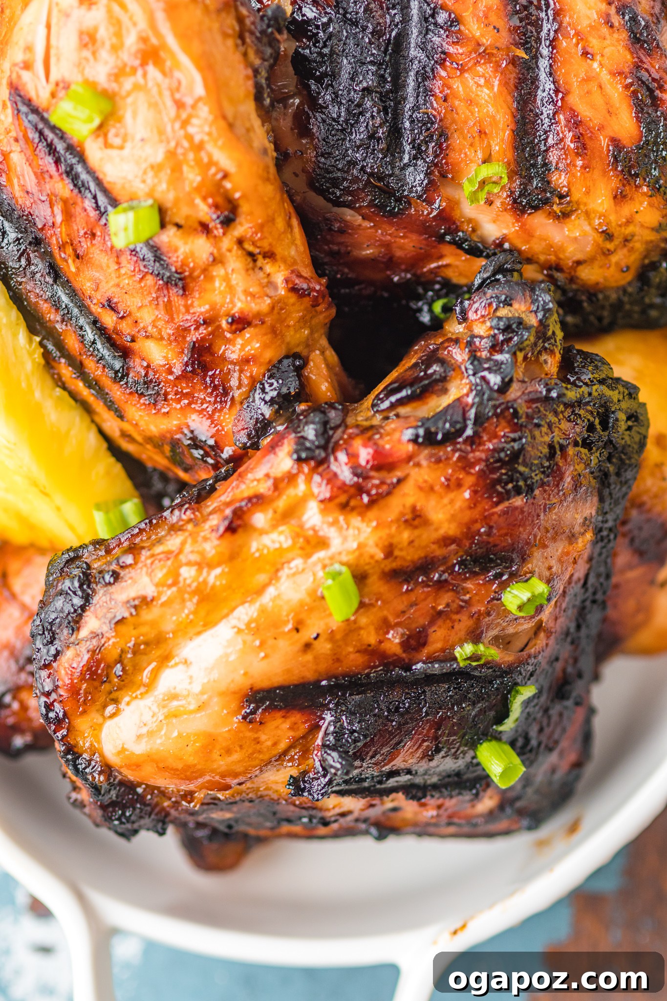 A vibrant platter of freshly grilled Huli Huli Chicken, showcasing its inviting glaze and tender texture, ready to be served.