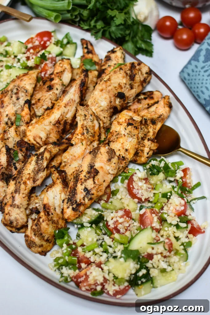 Tangy Yogurt Chicken 2 Yogurt Marinated Chicken served with tabbouleh and fresh herbs