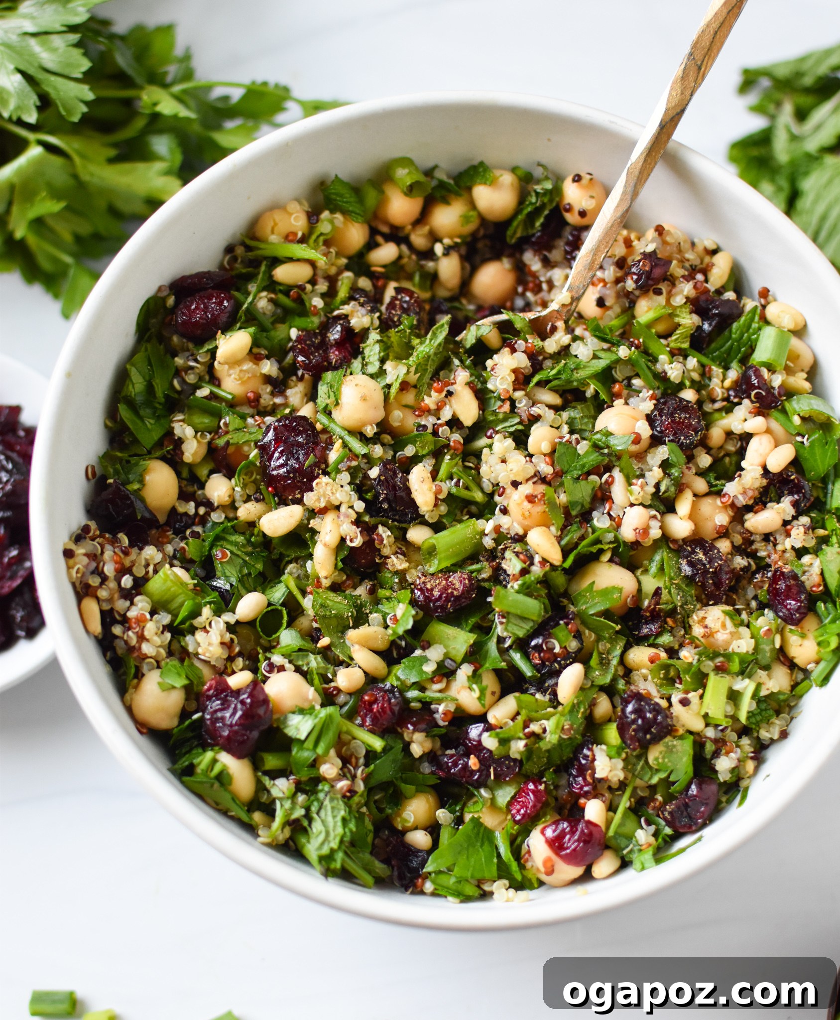 Sun-Kissed Mediterranean Stuffed Acorn Squash 9 Mediterranean quinoa salad mixture in a bowl, ready for stuffing.
