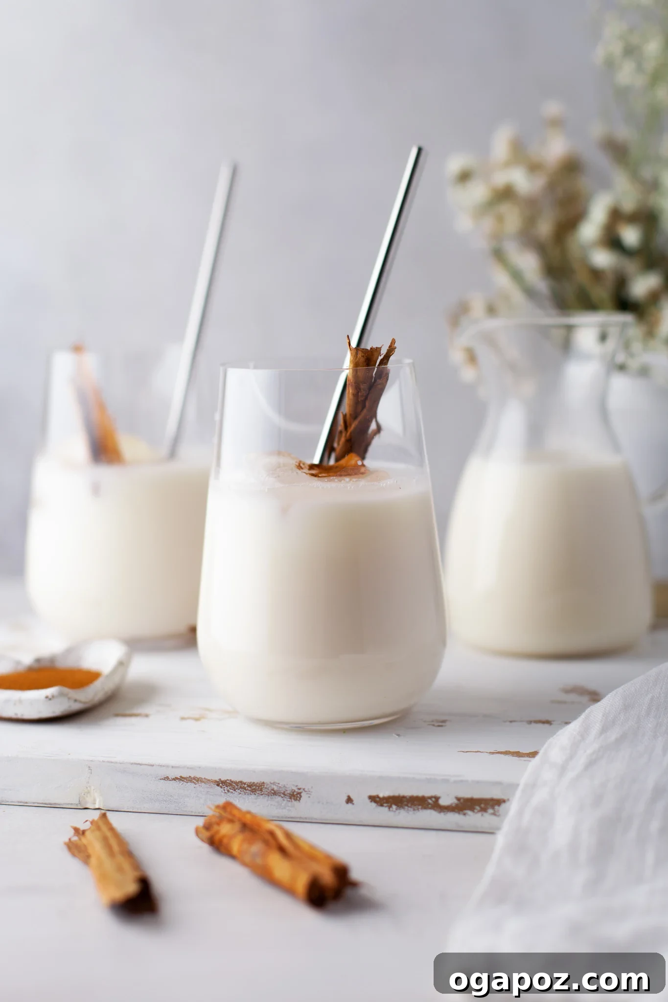 Sweet & Creamy Homemade Horchata 6 Three glasses of perfectly chilled Horchata, garnished with cinnamon, ready to be enjoyed.