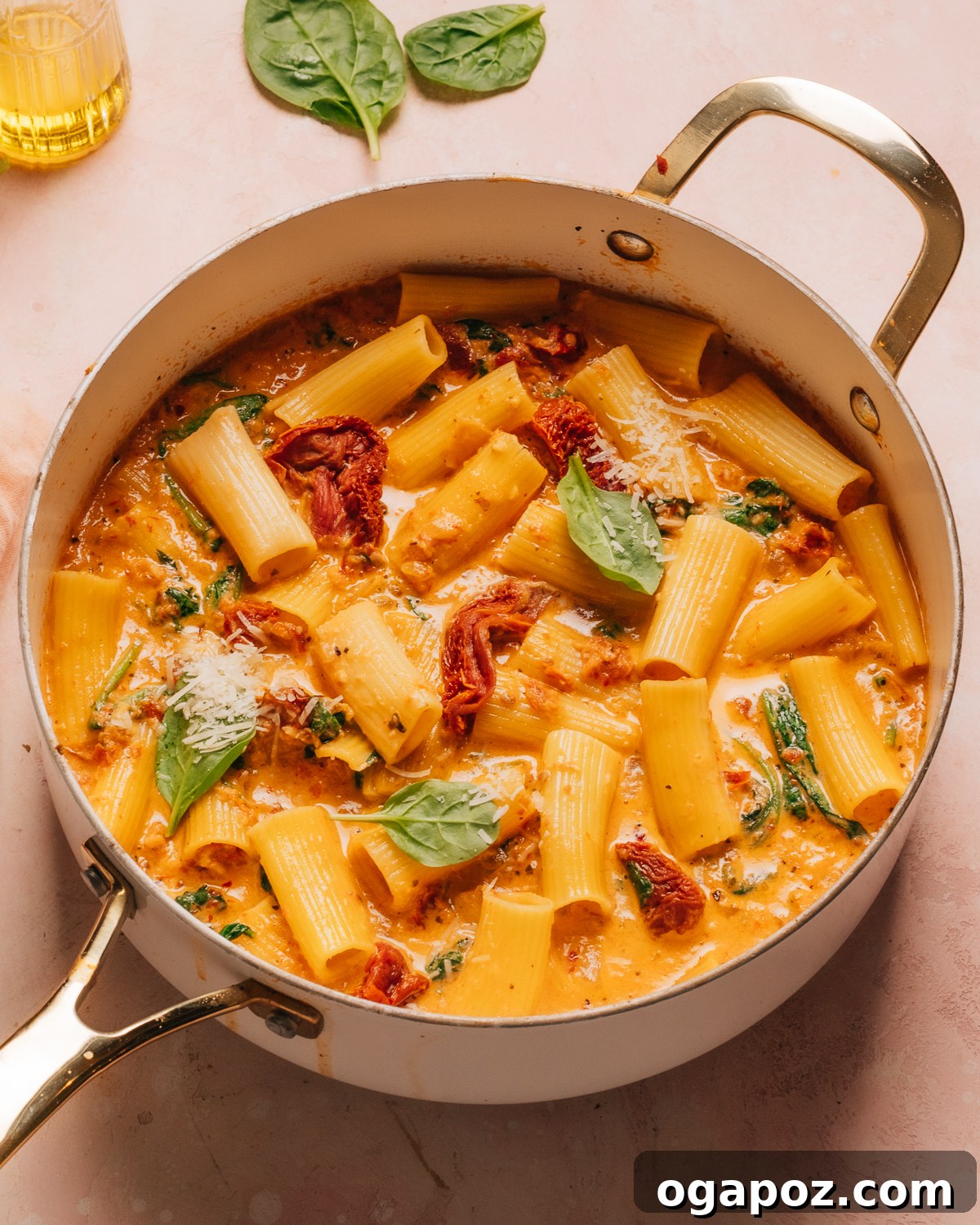 Creamy Tuscan Chicken Pasta 2 Tuscan Chicken Pasta in a saucepan.