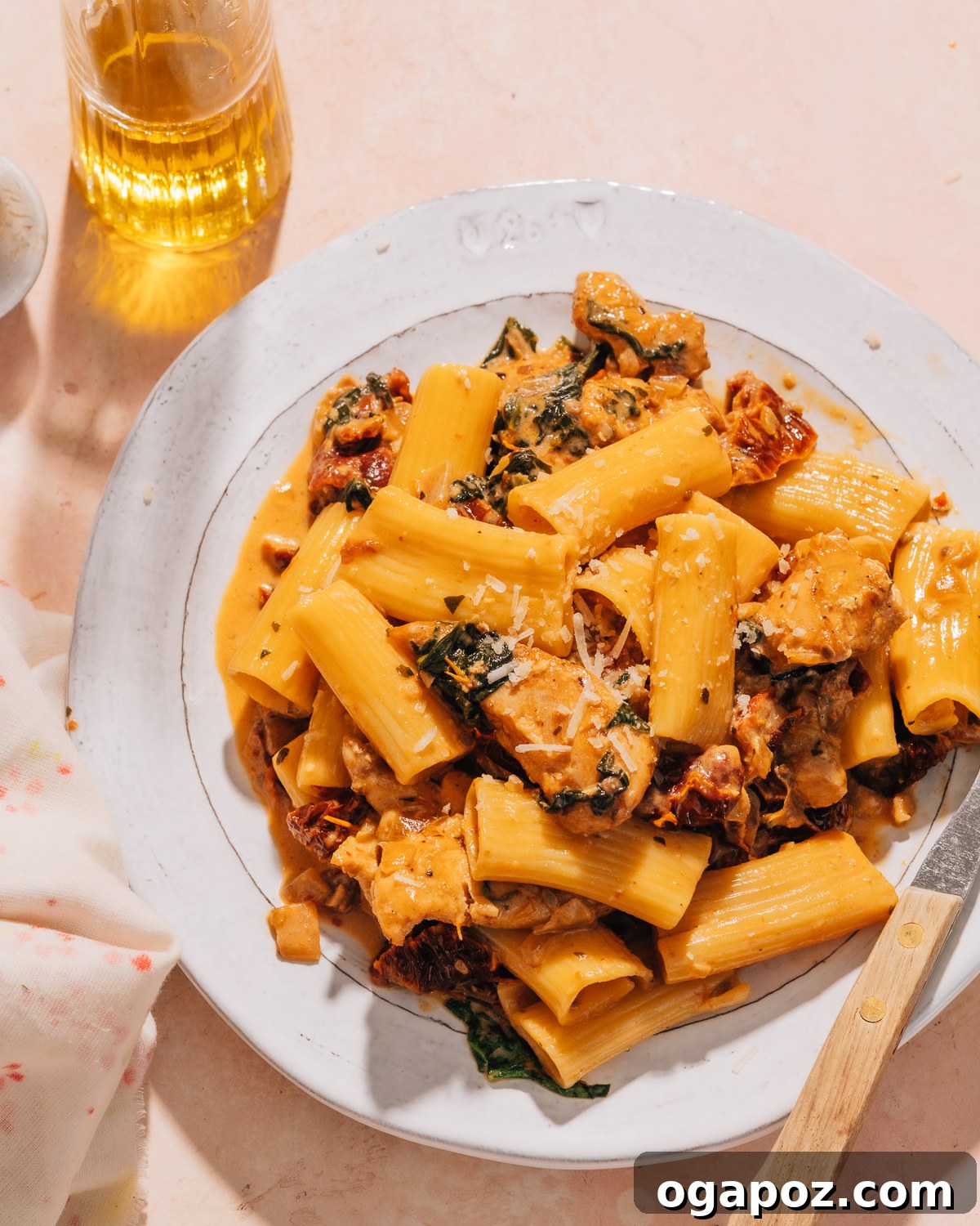 Creamy Tuscan Chicken Pasta 7 Tuscan Chicken Pasta on a plate.