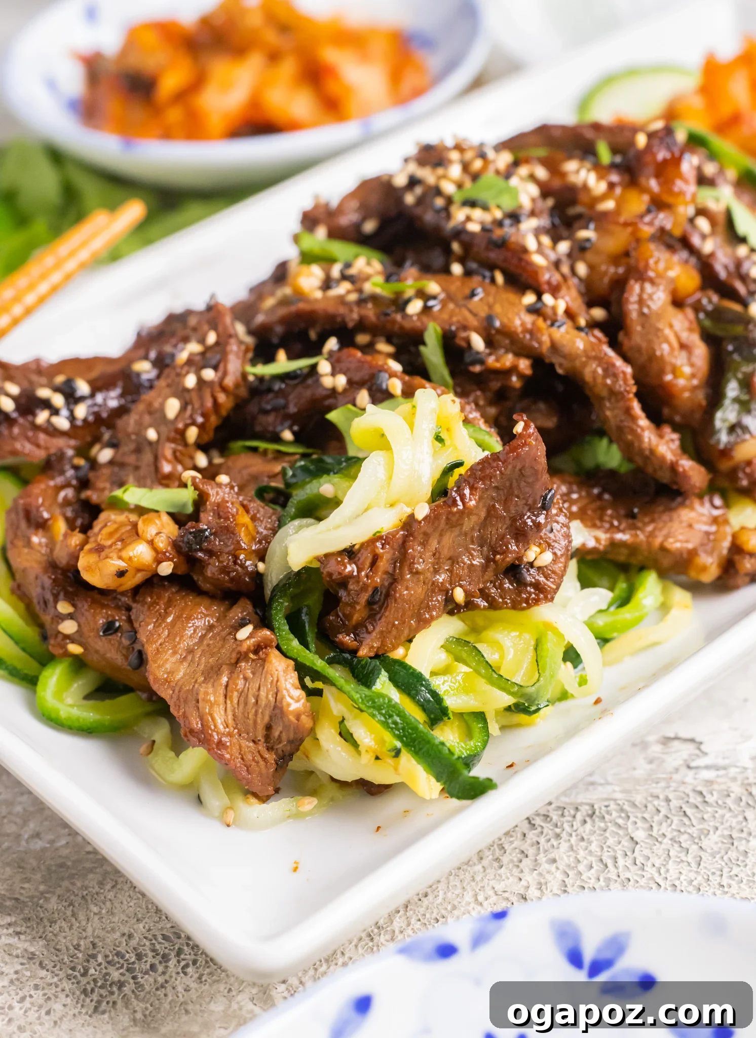 Savory Bulgogi Zucchini Ribbons 4 Close-up of Beef Bulgogi served with freshly spiralized zucchini noodles, creating a healthy and colorful dish.