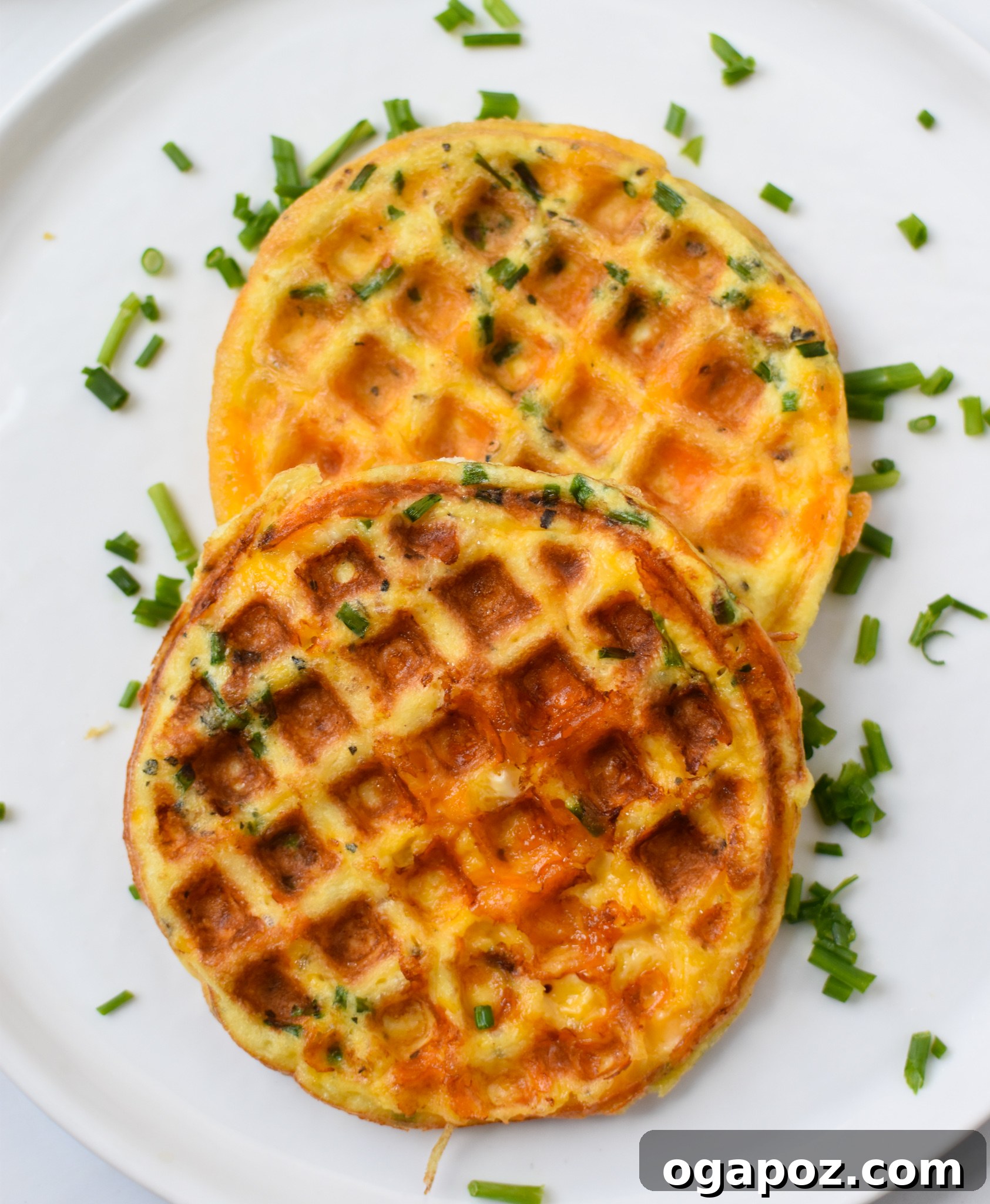 Quick and Easy Chaffles 2 Golden brown Chaffles Recipe (cheese and egg waffles) served on a white plate, ready to eat.