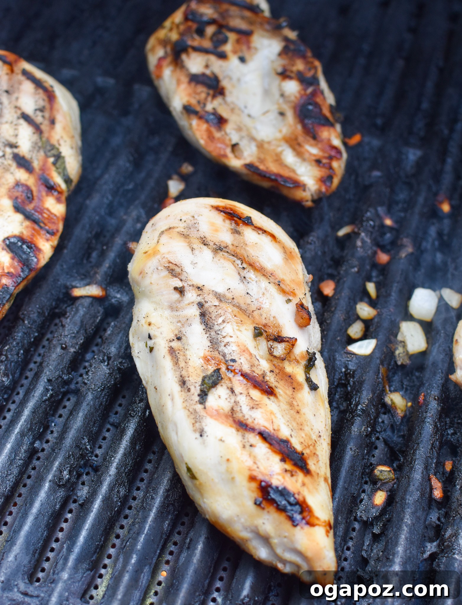 Citrus Margarita Grilled Chicken 7 Closeup of Margarita Grilled Chicken sizzling on the grill, almost ready to be removed.