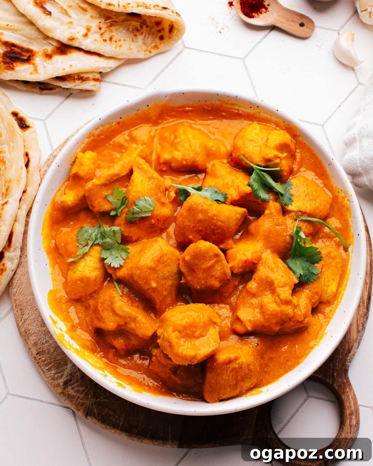 28 Healthy Chicken Recipes Easy Delicious Dietitian Approved 12 Healthy Chicken recipes showing creamy coconut curry chicken in a bowl, garnished with herbs
