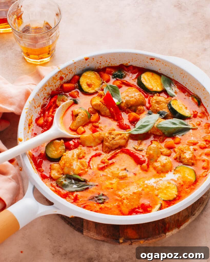 28 Healthy Chicken Recipes Easy Delicious Dietitian Approved 14 Spicy and creamy Thai Red Curry Chicken served in a bowl with rice and fresh basil
