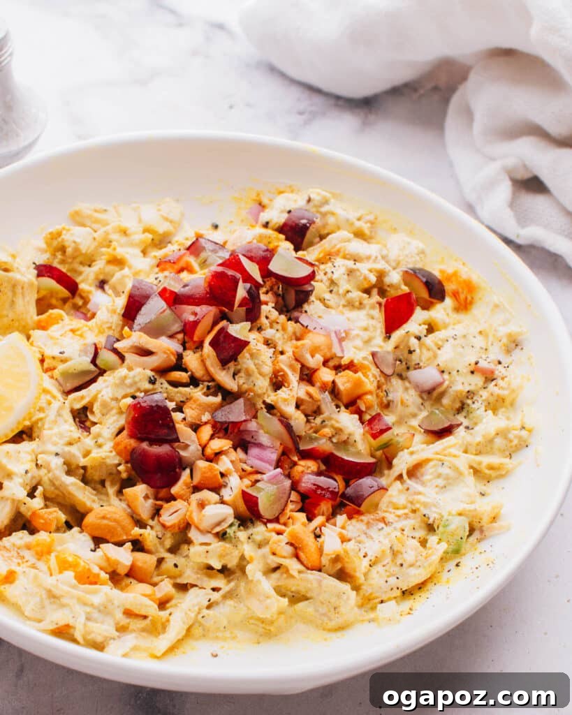 28 Healthy Chicken Recipes Easy Delicious Dietitian Approved 32 Creamy Curry Chicken Salad with Grapes, garnished with fresh herbs