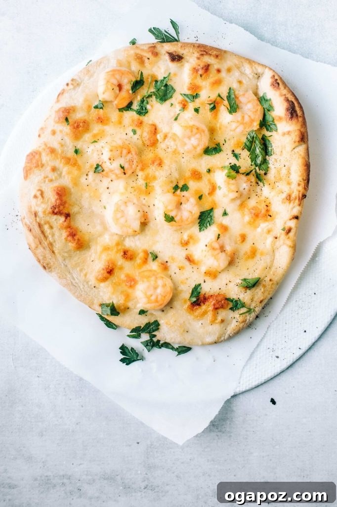 Simple Christmas Bites Everyone Craves 21 This Shrimp Pizza with a Garlicky Cream Sauce Recipe is the pizza incarnation of shrimp fettuccine alfredo. It's flavourful and easy, making it the perfect meal for a healthy weeknight dinner.