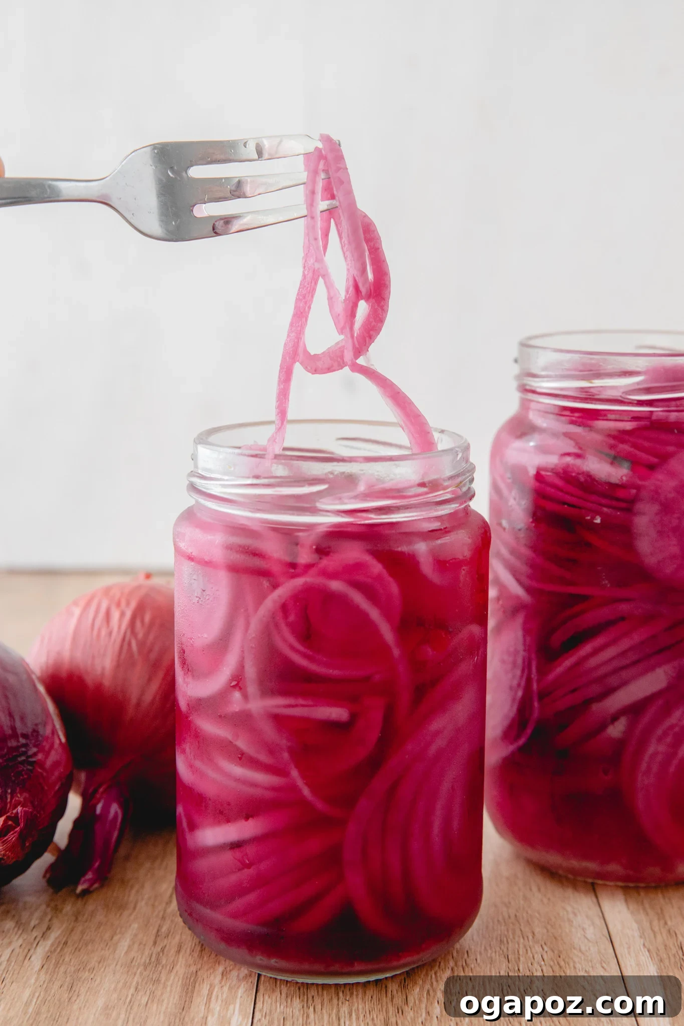 Blush Hour Onions 2 Quick Pickled Red Onions in jar, ready to be served.