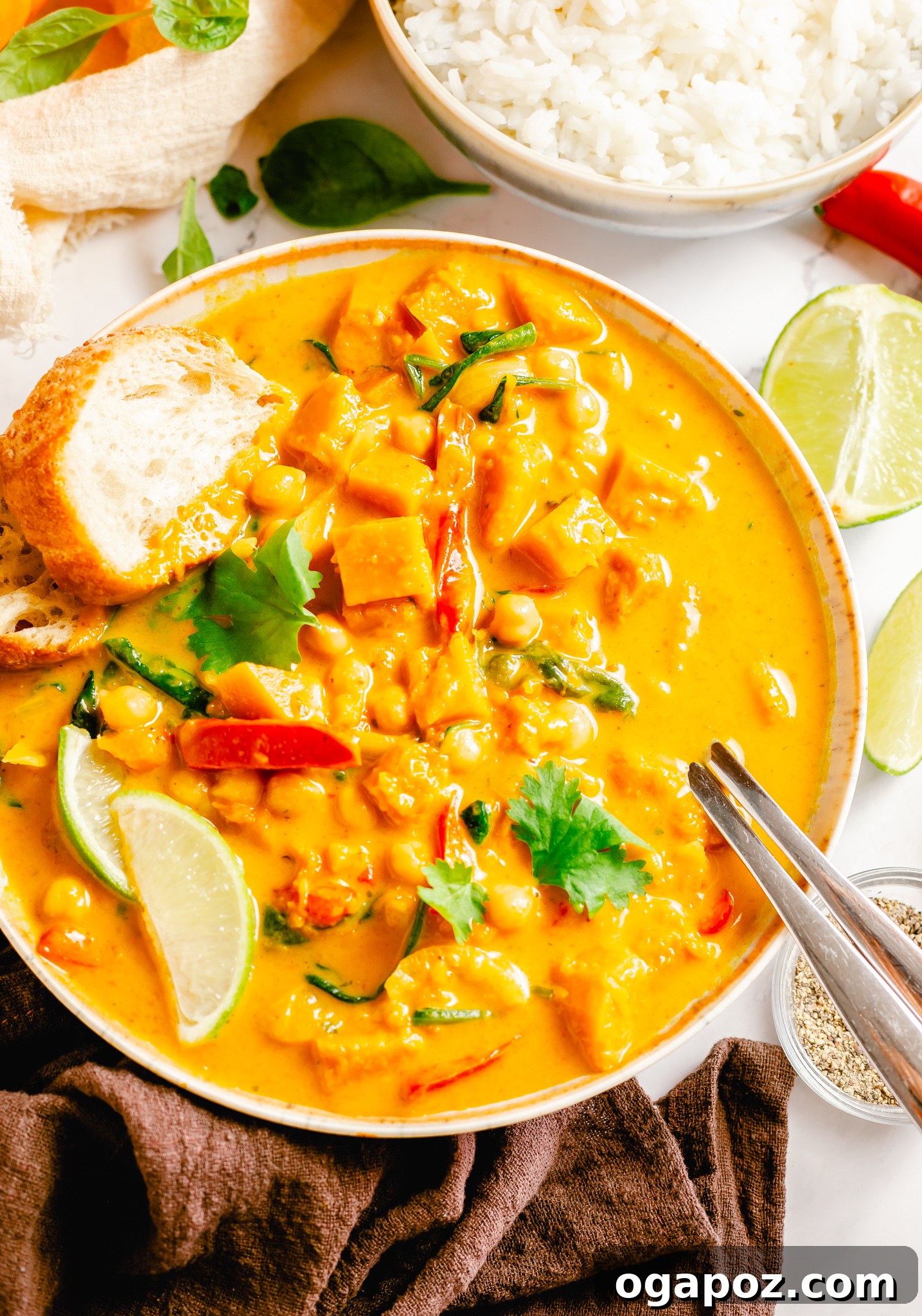 A spoonful of Pumpkin Curry Recipe in a bowl.