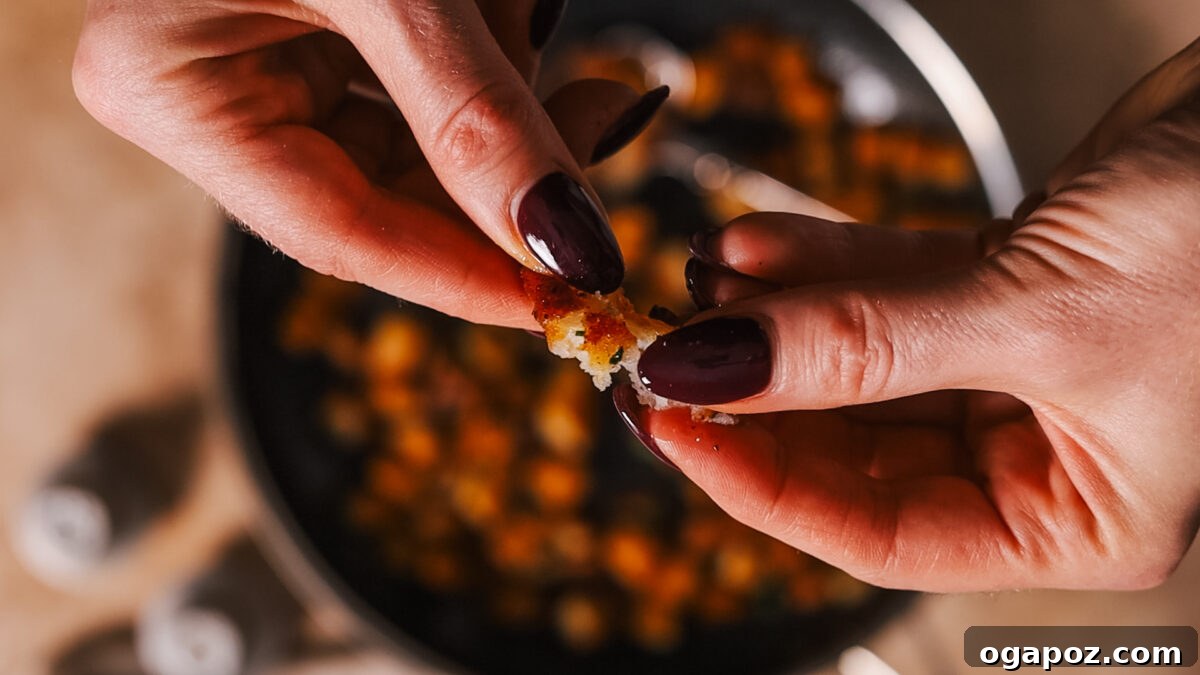 Crispy Fluffy French Fries 8 Checking fried potato for crispiness
