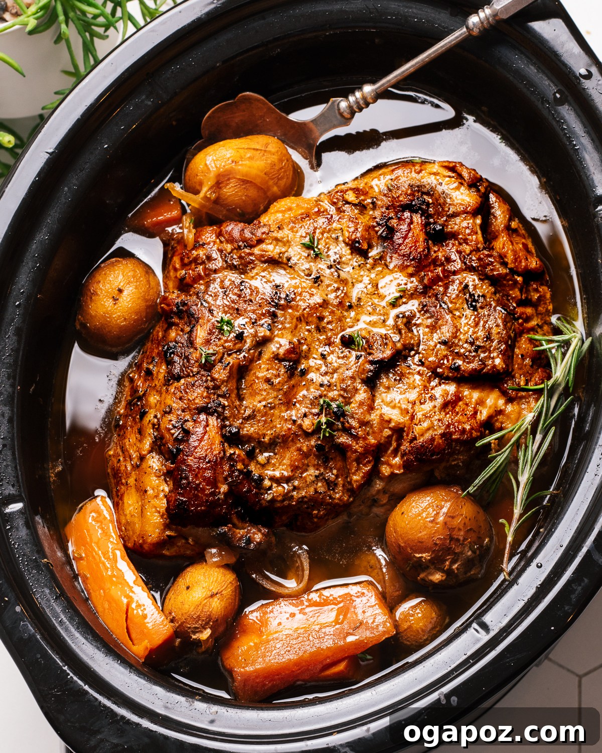 Melt in Your Mouth Slow Cooked Pork Shoulder 4 Slow Cooker pork shoulder in the crockpot with vegetables and liquid, ready to begin cooking.