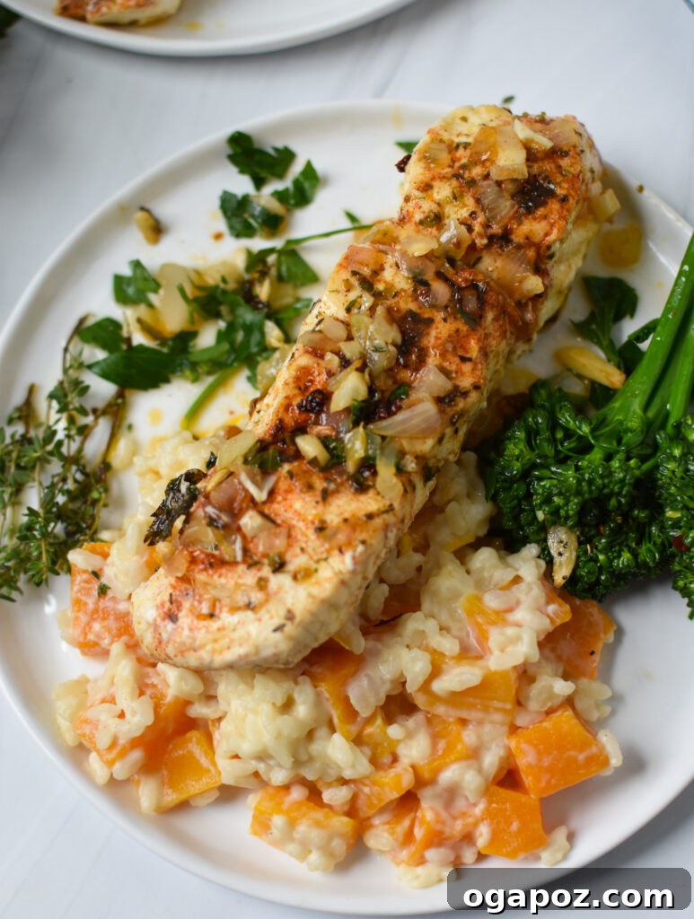 Zesty Lemon Garlic Halibut 4 Perfectly pan-seared Lemon Garlic Halibut served alongside a rich and creamy risotto, garnished with lemon slices and fresh parsley.