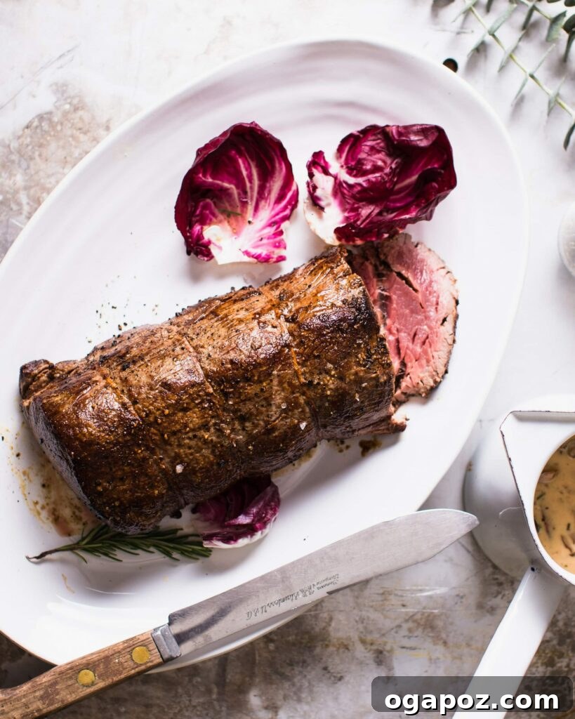 Mouthwatering Boneless Beef Ideas 17 Roast Beef Tenderloin with Mushroom Cream Sauce, exquisitely plated.