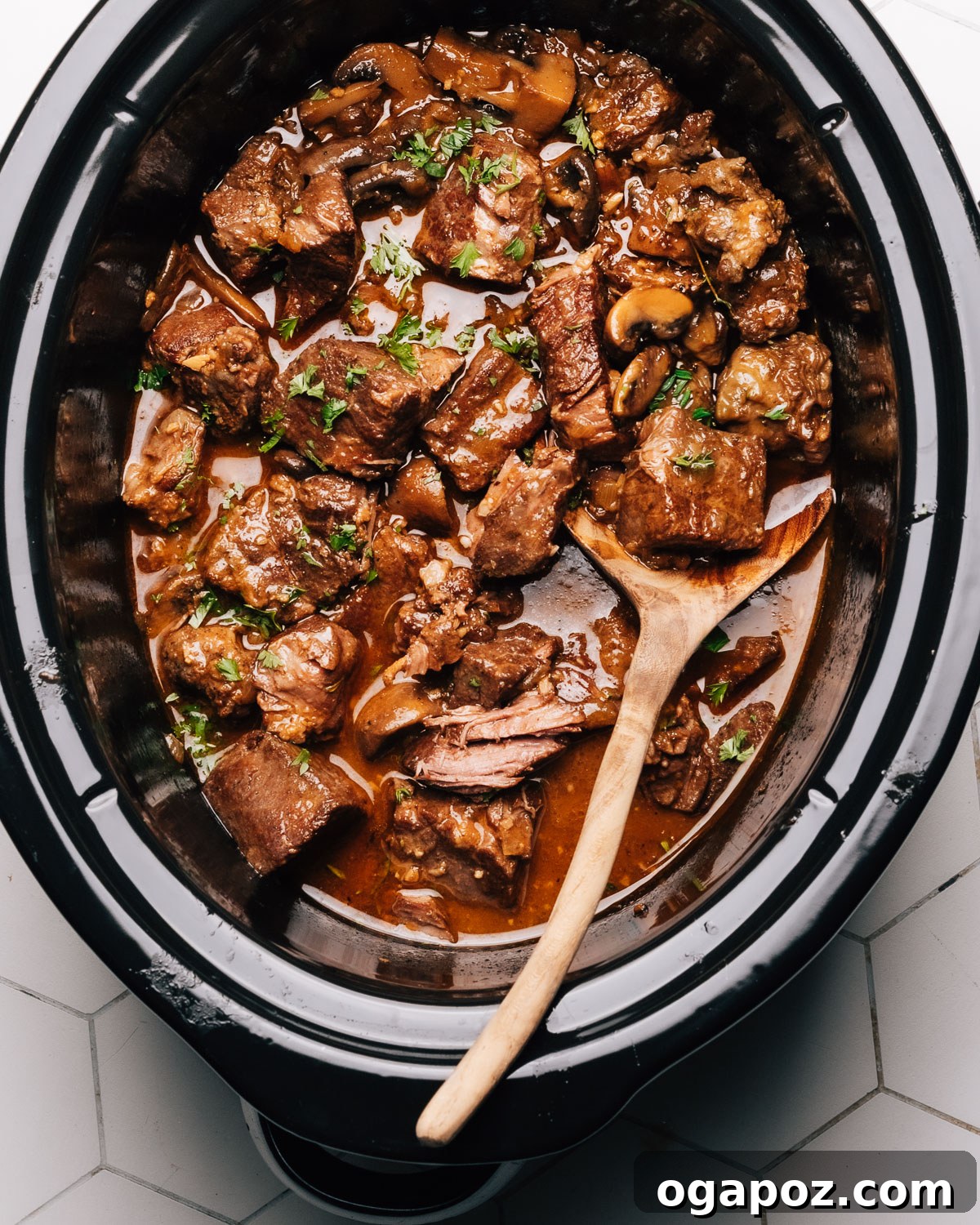 Mouthwatering Boneless Beef Ideas 6 Crockpot beef tips in gravy, ready to be served over starch.