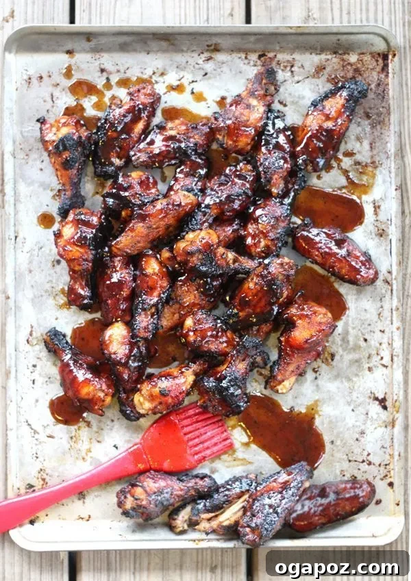 The Ultimate Chicken Wing Sauce Collection 17 Pop-A-Top Dr Pepper Sauce in a bowl, with a Dr Pepper can in the background.