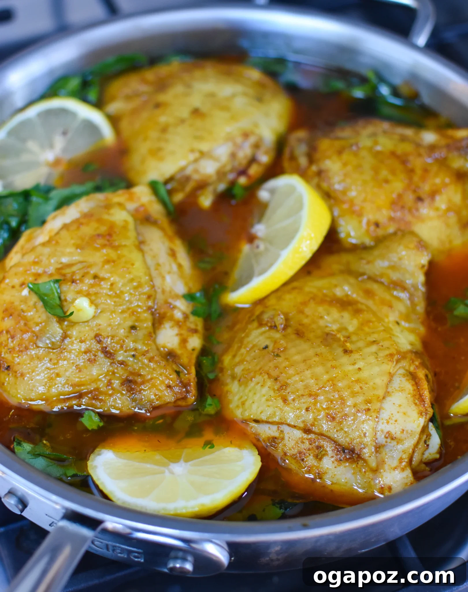 Akdeniz Lezzetleriyle Tek Tencere Tavuk Pilavı 7 One Pot Mediterranean Chicken and Rice baking in an oven-safe pot, covered.