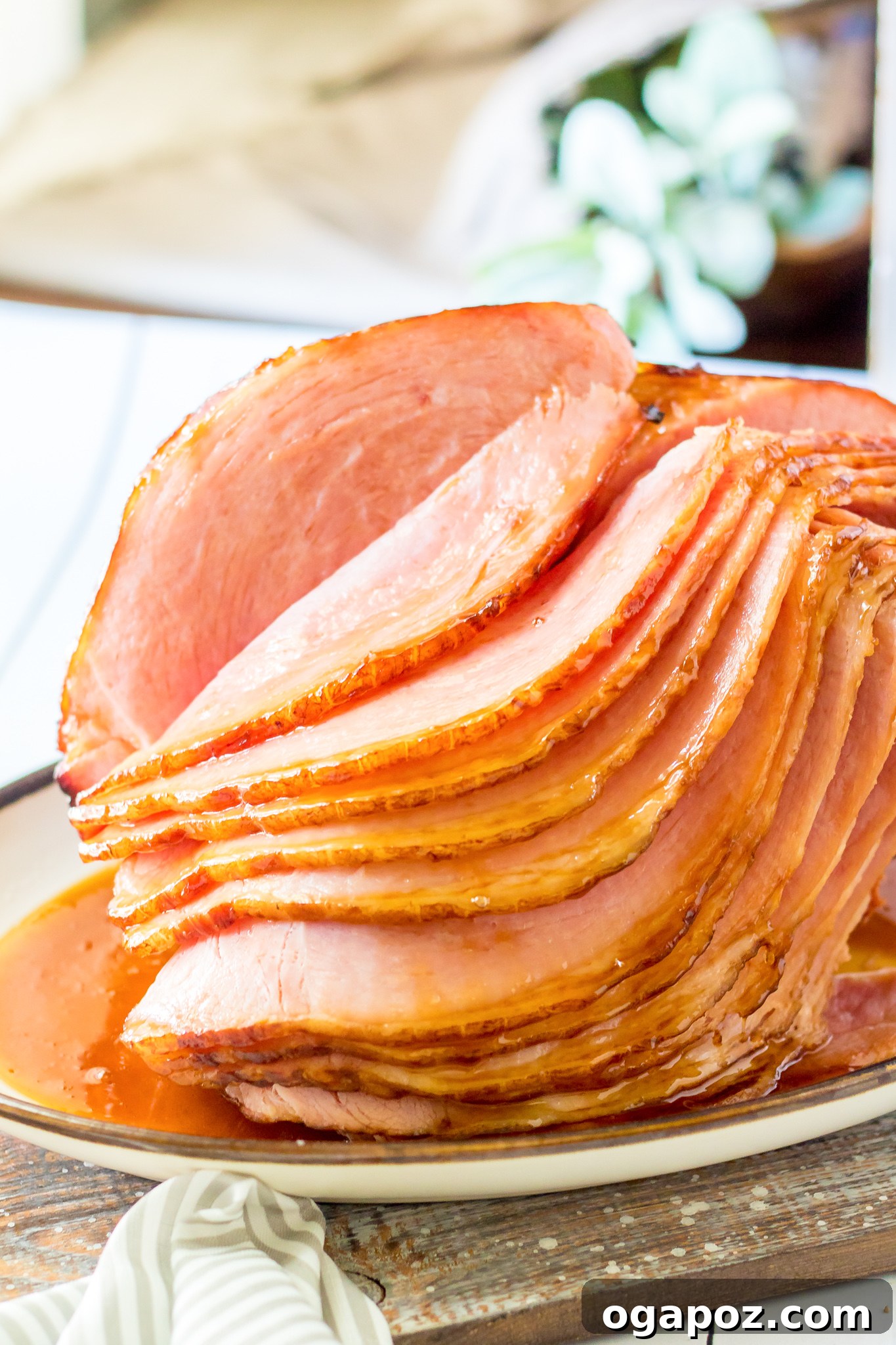 Sweet Apple Cider Glazed Ham 2 Apple Cider Glazed Ham Recipe on a platter, ready to serve.