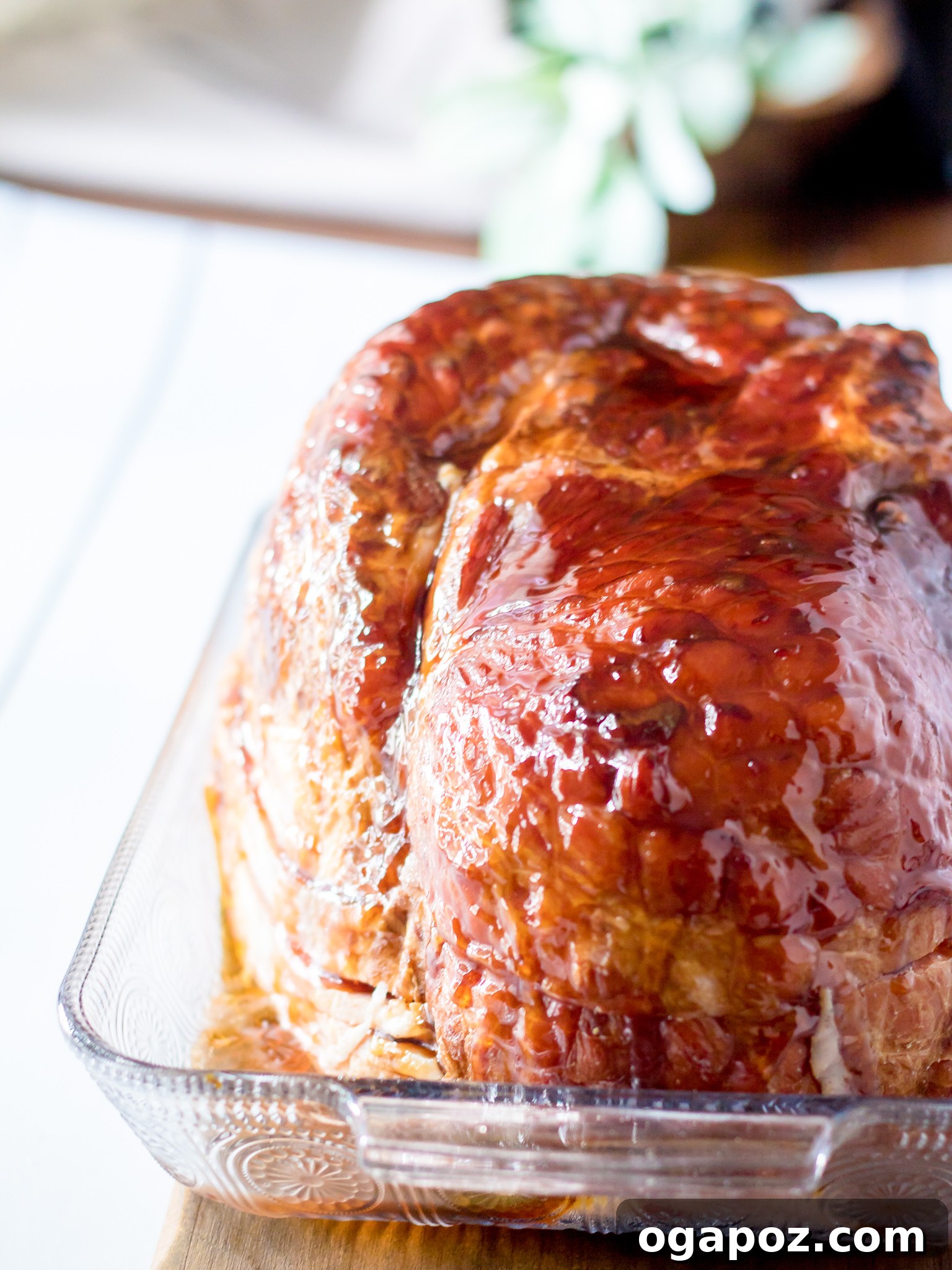 Sweet Apple Cider Glazed Ham 7 Apple Cider Glazed Ham Recipe on a cutting board, ready for carving.