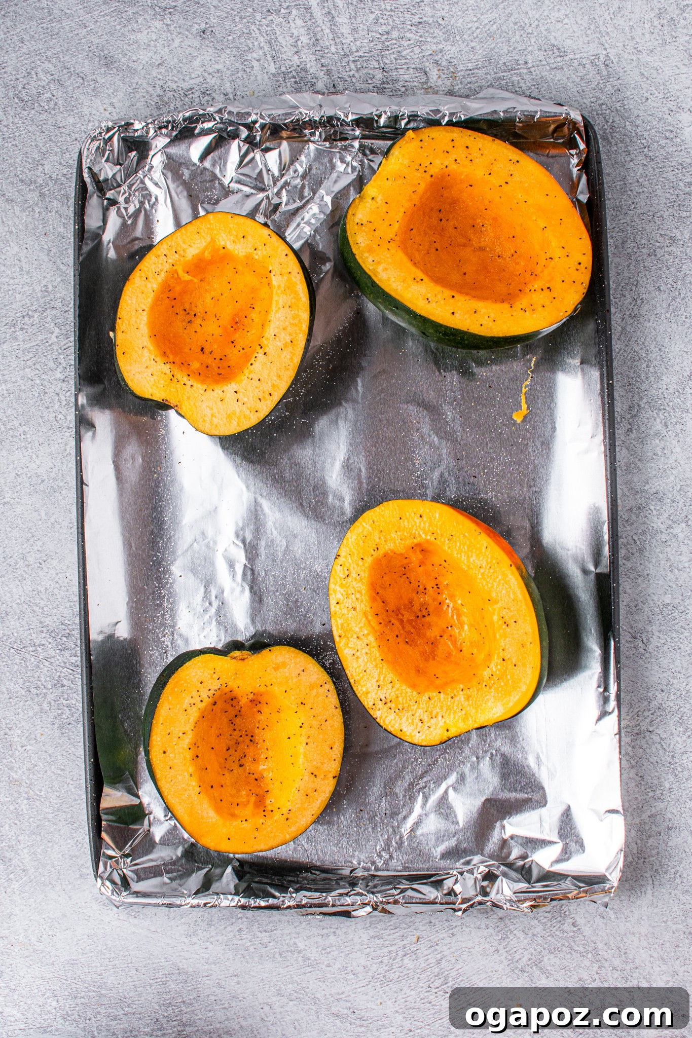 Autumn Gold Butternut and Sweet Potato Soup 4 Butternut Squash and Sweet Potato Soup acorn squash on a baking sheet.