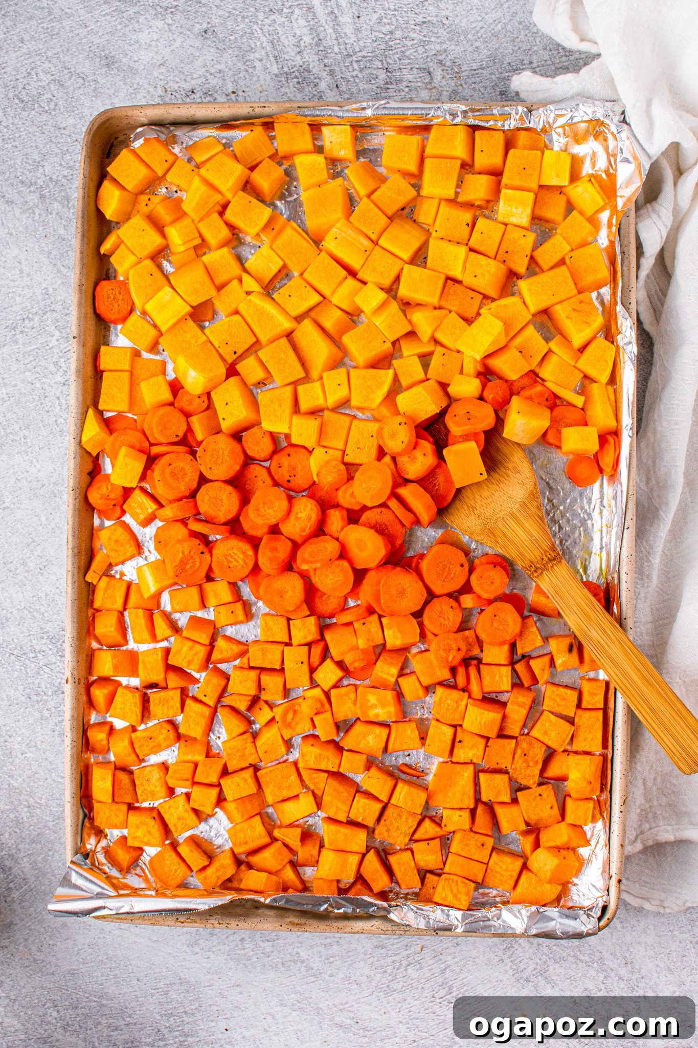 Autumn Gold Butternut and Sweet Potato Soup 5 Butternut Squash and Sweet Potato Soup vegetables on a baking sheet.