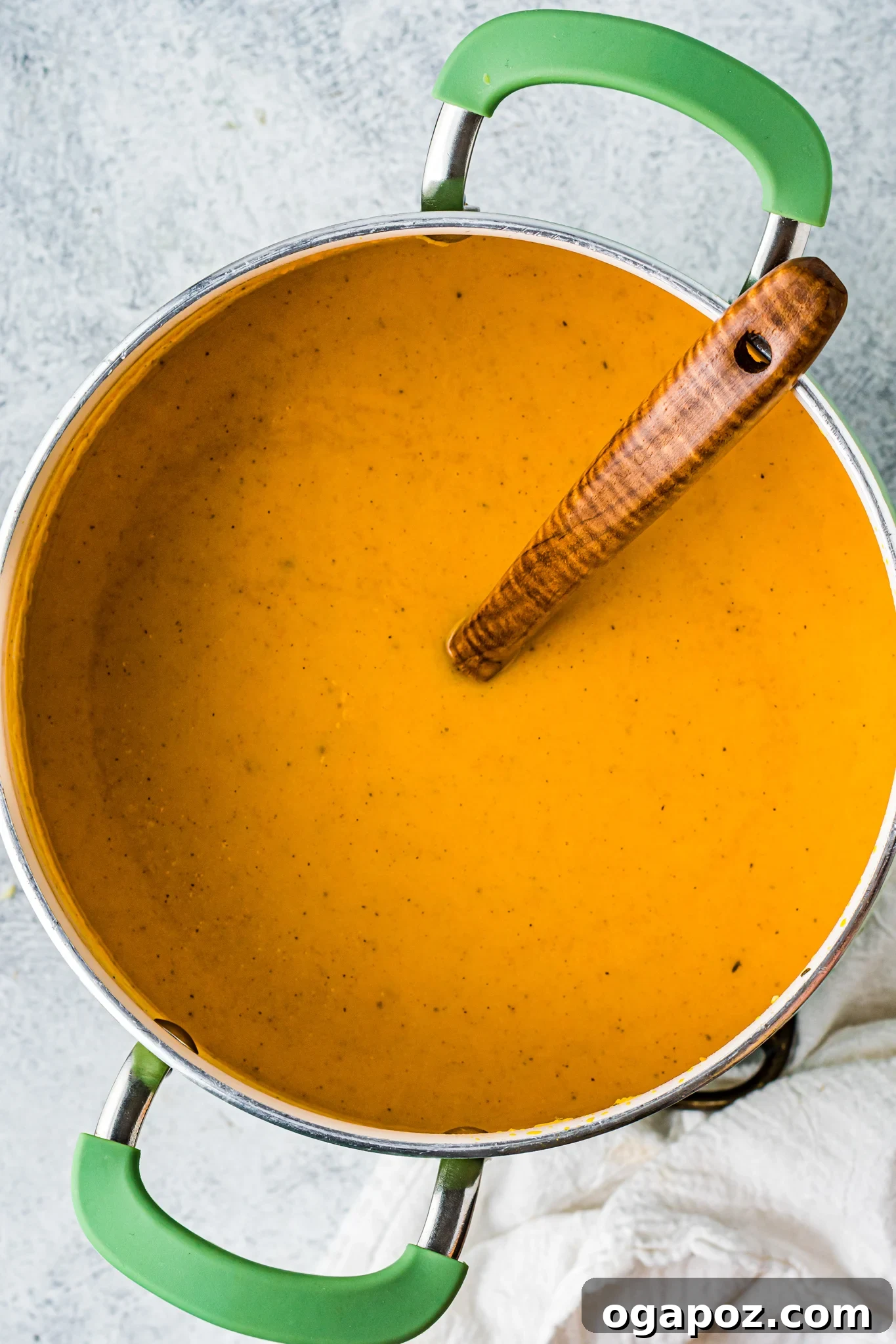 Autumn Gold Butternut and Sweet Potato Soup 7 Butternut Squash and Sweet Potato Soup pureed in a pot.