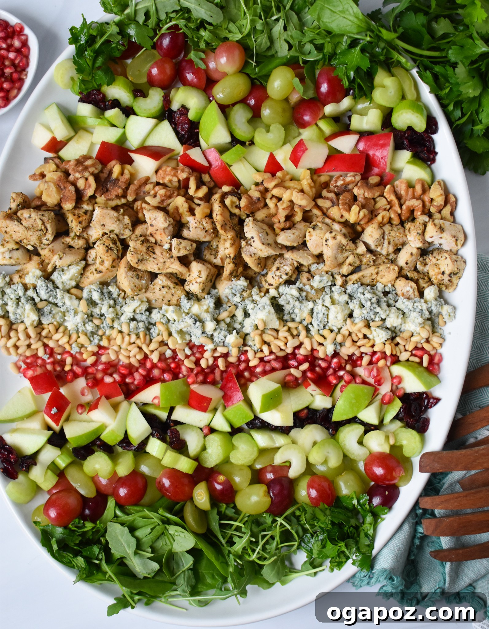 Crisp Apple and Walnut Waldorf Salad 4 Deconstructed Waldorf Salad artfully arranged on a white platter, ready for serving.