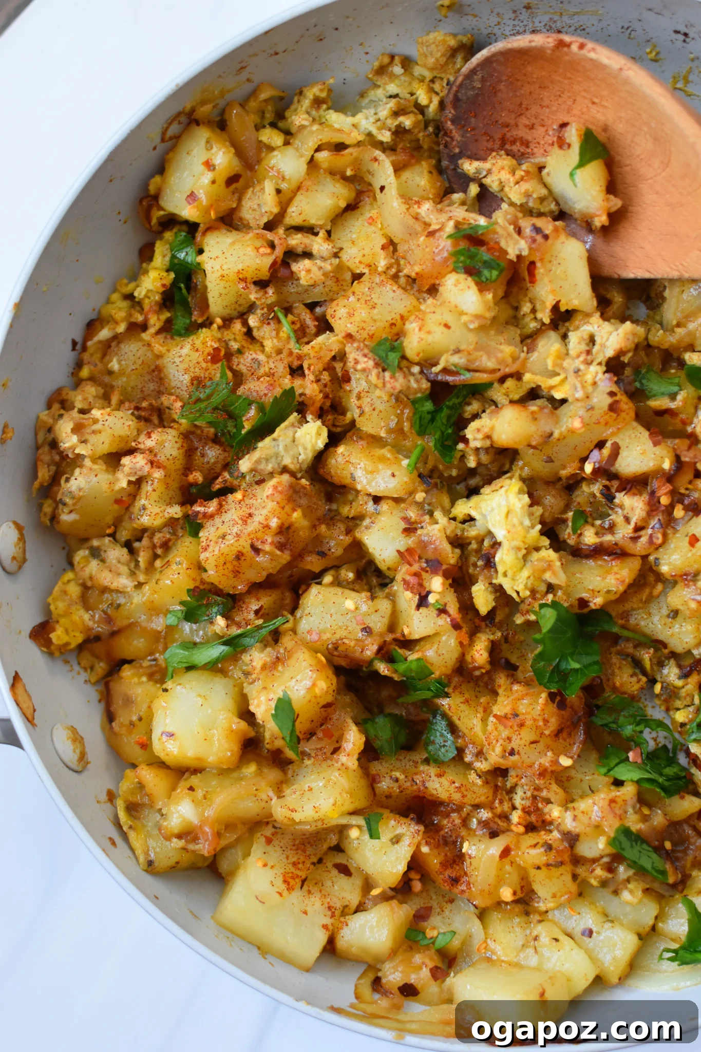 Savory Lebanese Potatoes and Eggs 11 A serving of Lebanese Potato and Egg Recipe beautifully garnished with fresh parsley.