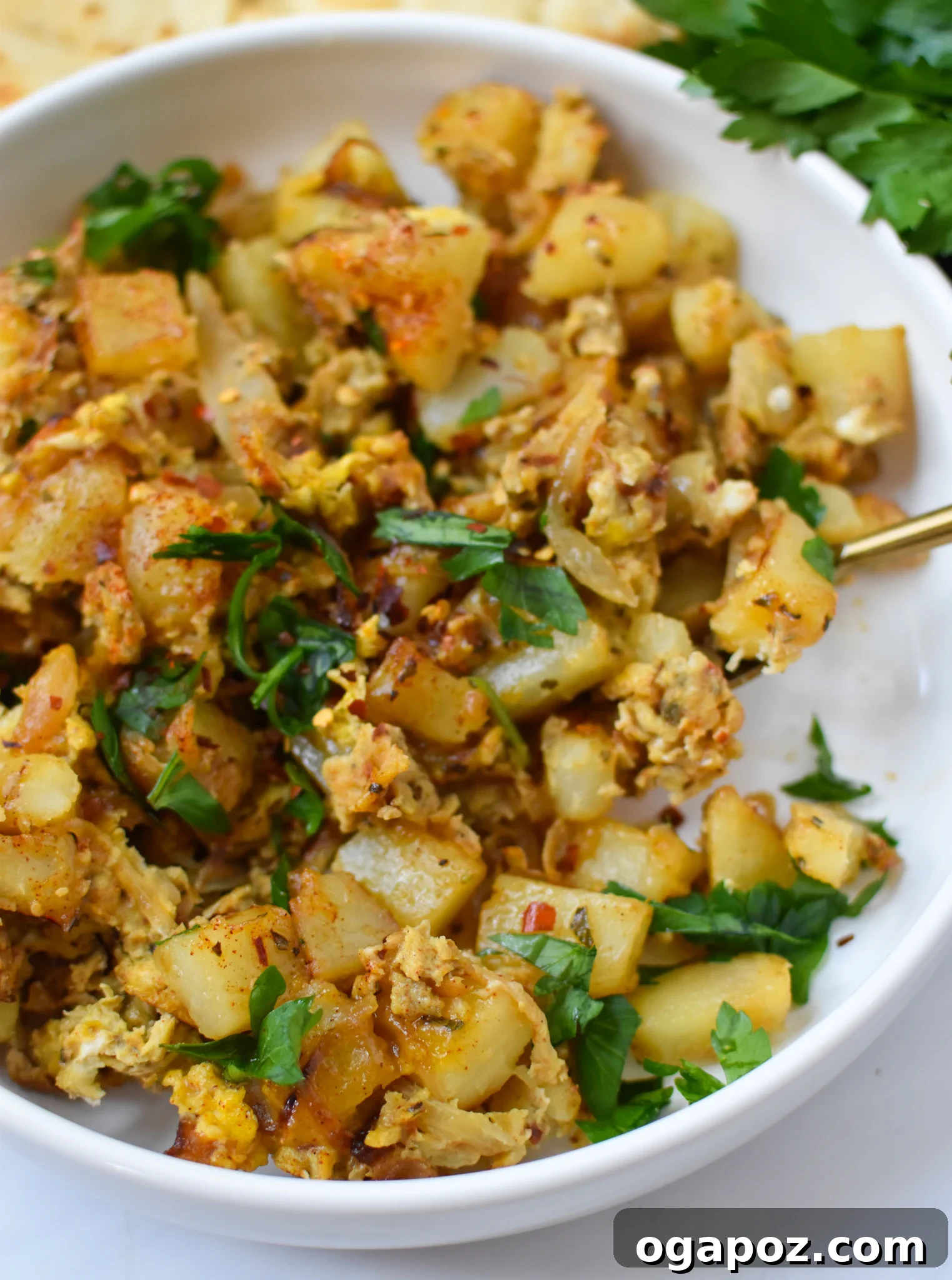 Savory Lebanese Potatoes and Eggs 3 A bowl of Lebanese Potato and Egg Recipe, showcasing its rich texture.