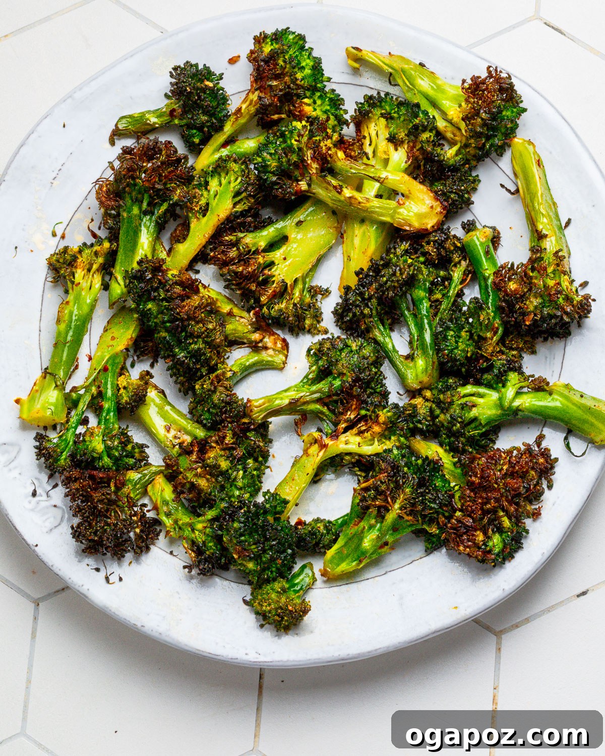 Effortlessly Crispy Air Fryer Broccoli 7 Finished air fryer broccoli served on a plate.