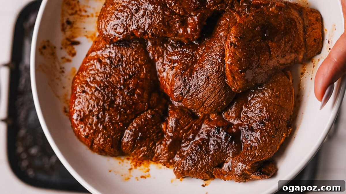 Ultimate Juicy Beef Fajitas 7 cooked steak resting on a plate