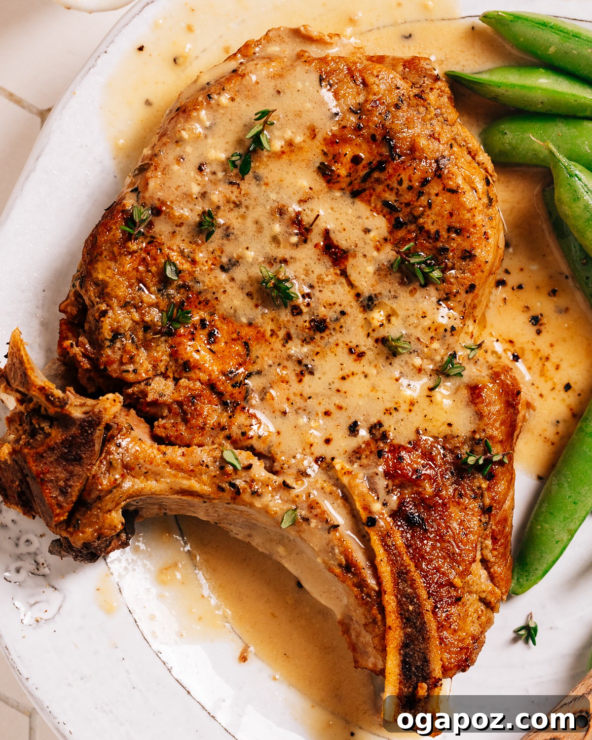 Fork Tender Instant Pot Pork Chops and Simple Gravy 11 Close-up of a finished Instant Pot pork chop dish, with rich gravy.