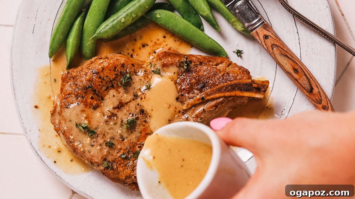 Fork Tender Instant Pot Pork Chops and Simple Gravy 10 Serving the Instant Pot pork chops generously topped with homemade gravy.