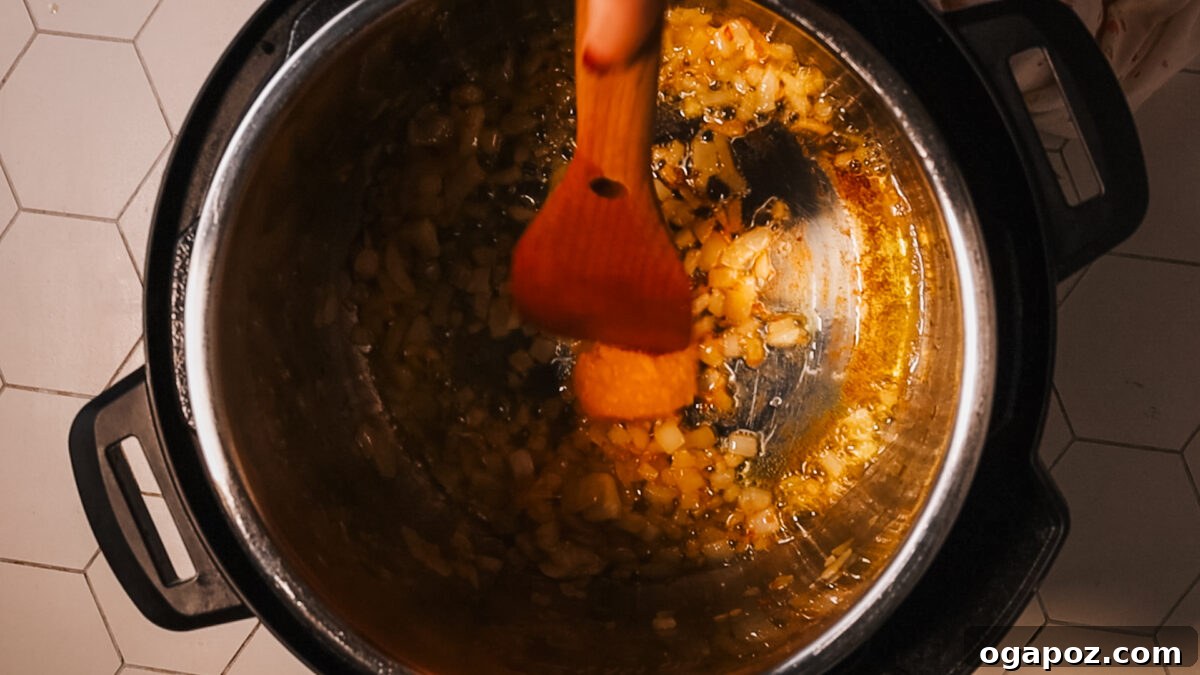 Effortless and Delicious Instant Pot Potato Soup 6 dicing onion in pot