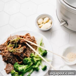 Slow Cooker Korean Ribs, glazed and tender, served with rice.