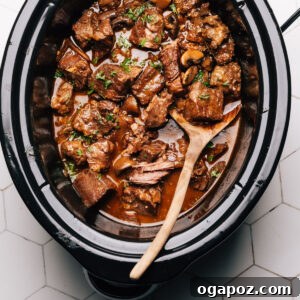 Close-up of Crockpot Beef Tips with gravy, ready to serve.