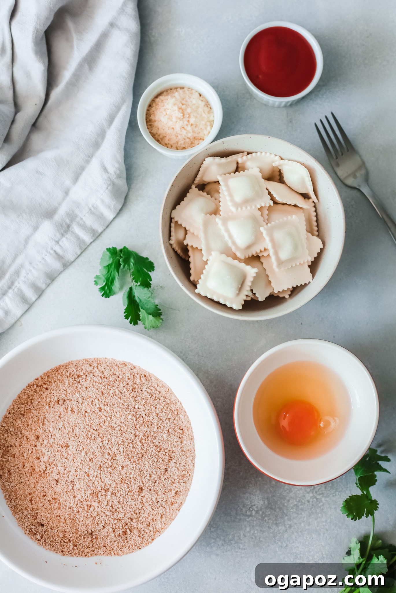 Crispy Air-Fried Ravioli Bites 3 Ingredients for Air Fried Ravioli laid out on a kitchen counter.