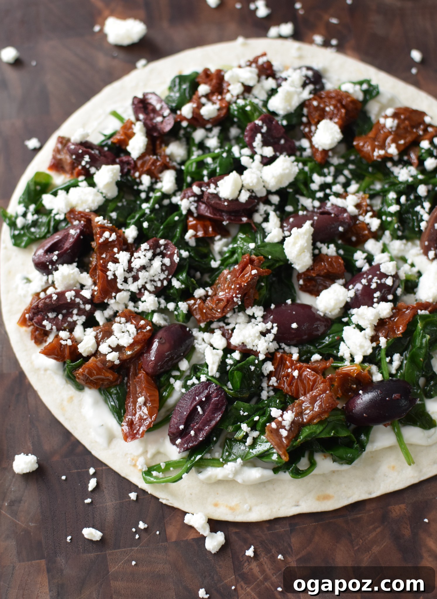 Easy Vegetarian Quesadilla Recipe ingredients layered on a tortilla before folding