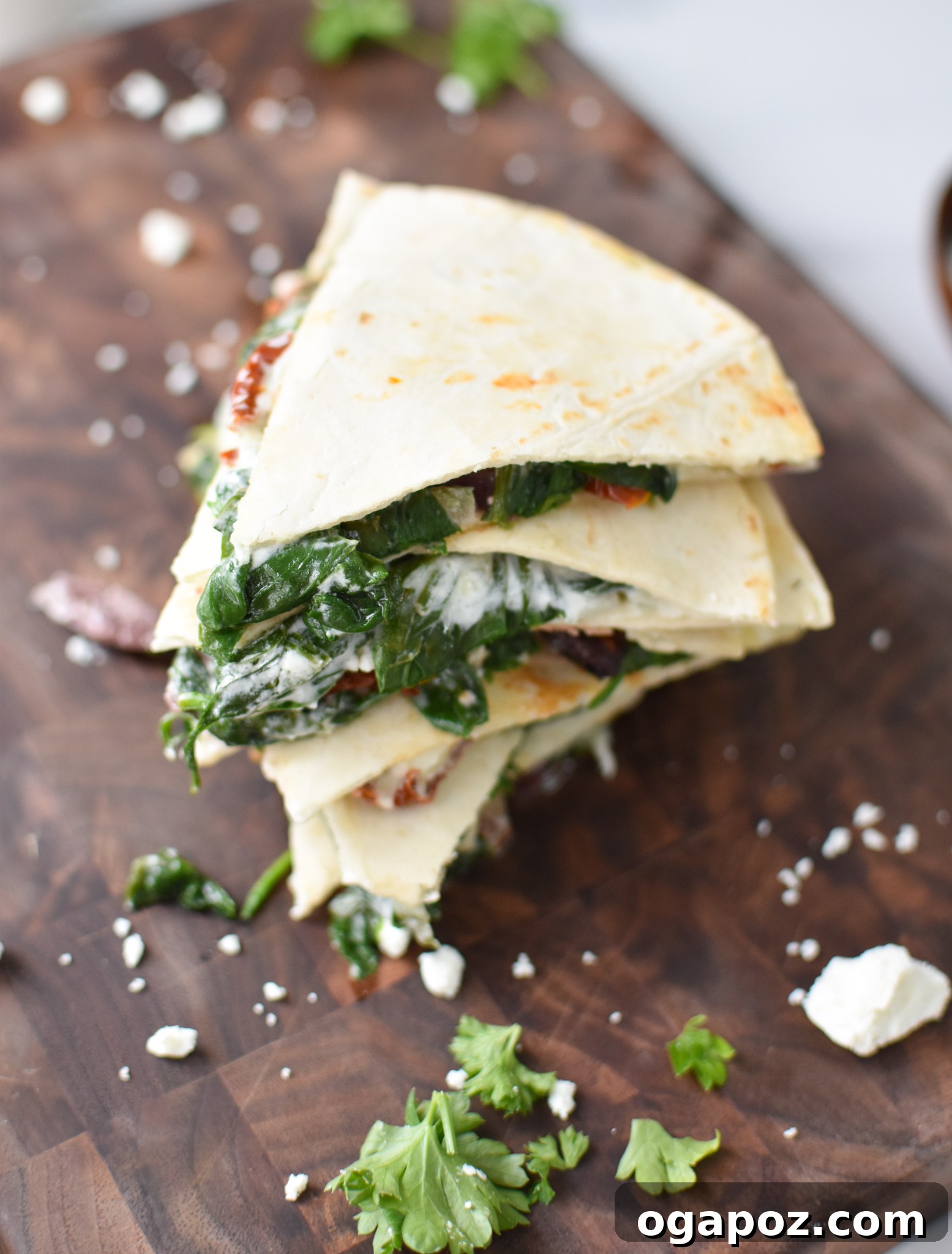 Easy Vegetarian Quesadilla Recipe sliced on a cutting board