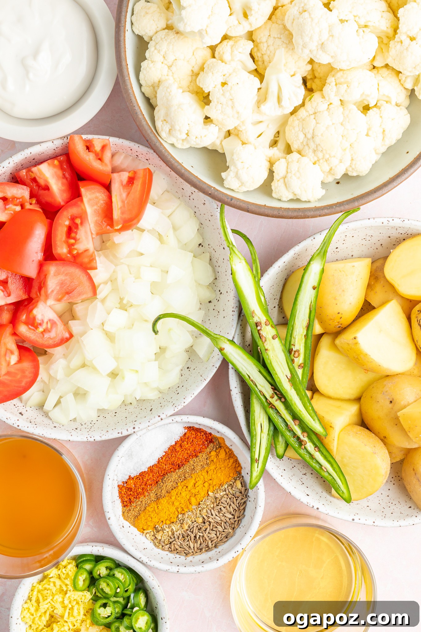 Cauliflower Curry Recipe ingredients laid out on a table.